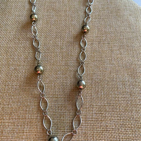 Long mixed metal silver and gold tone necklace. - Picture 1 of 4